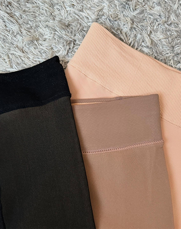 Tri para termo unihopa u crnoj, bež i braon boji na teksturiranoj površini.